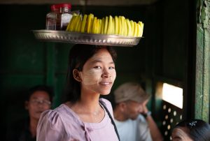gir selling mangos in myanmar in a yangoon train